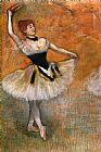 Dancer with a tambourine by Edgar Degas